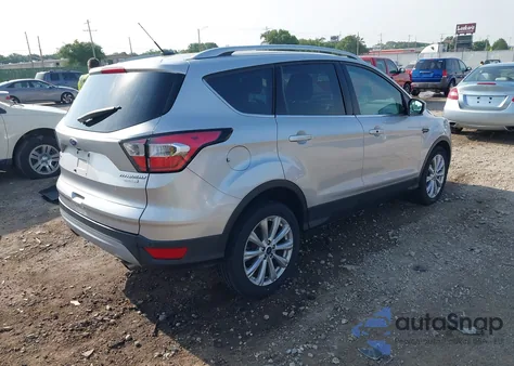 2017 Ford Escape Titanium z USA, uszkodzony, nr VIN 1FMCU0JD8HUD08360